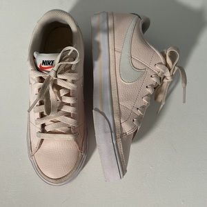 NIKE pink and white shoes, size 6 in women’s.